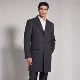 The Broker Men's Tailored Overcoat in Dark Charcoal, worn by model