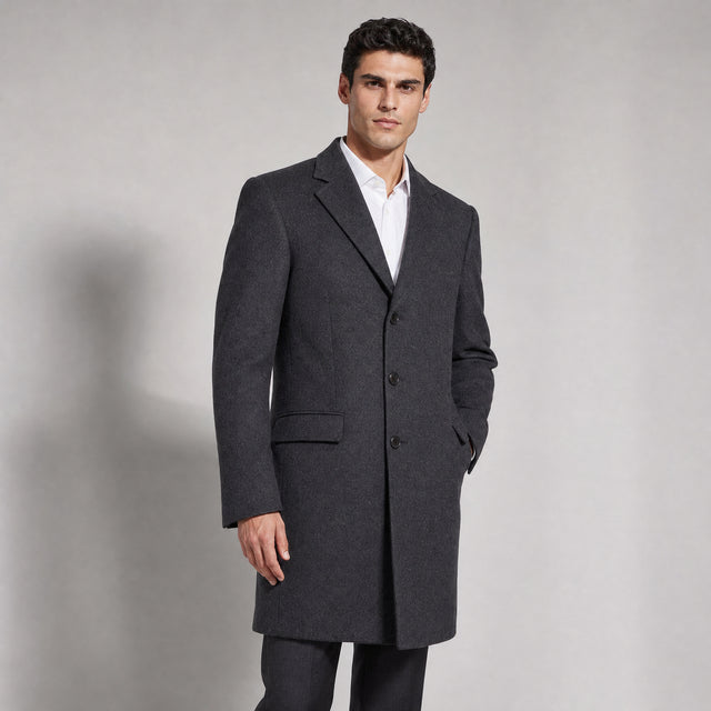 The Broker Men's Tailored Overcoat in Dark Charcoal, worn by model
