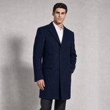 The Broker Men's Tailored Overcoat in Midnight Navy, worn by model