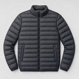 The Draftsman Men's Quilted Puffer Jacket in Graphite, flat lay