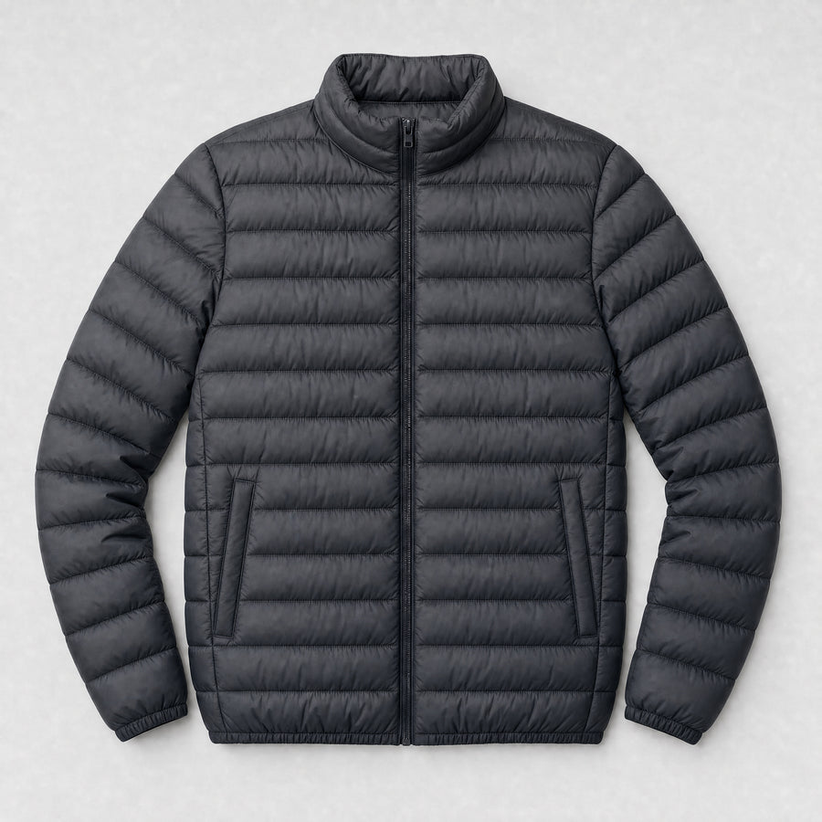 The Draftsman Men's Quilted Puffer Jacket in Graphite, flat lay
